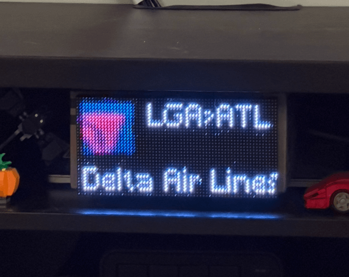 image of an LED panel connected with multicolor wires to a microcontroller