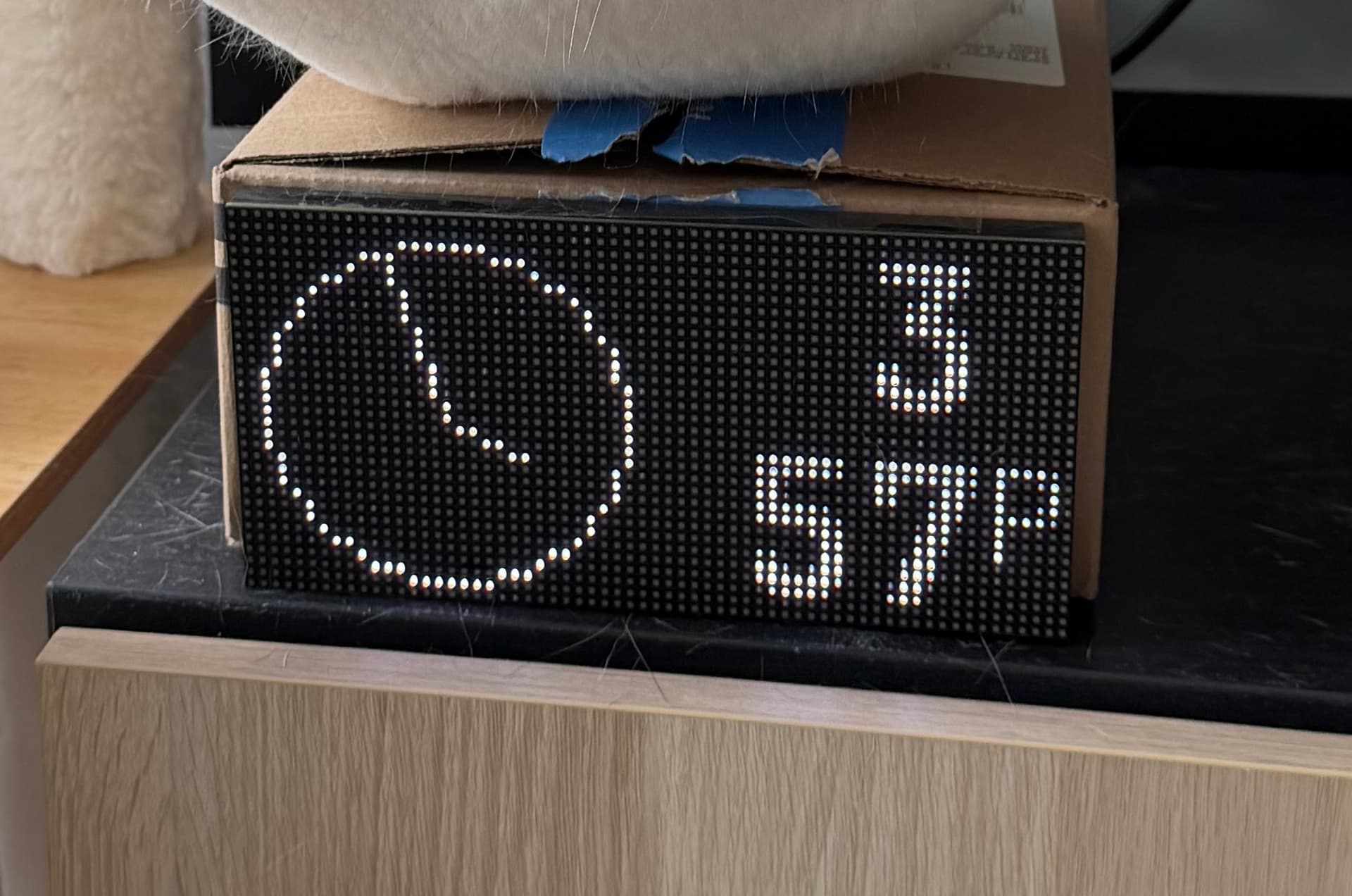 image of an LED panel connected with multicolor wires to a microcontroller